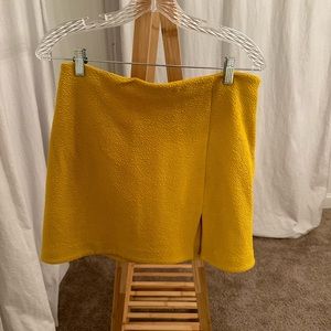 Yellow Anthropologie split skirt.